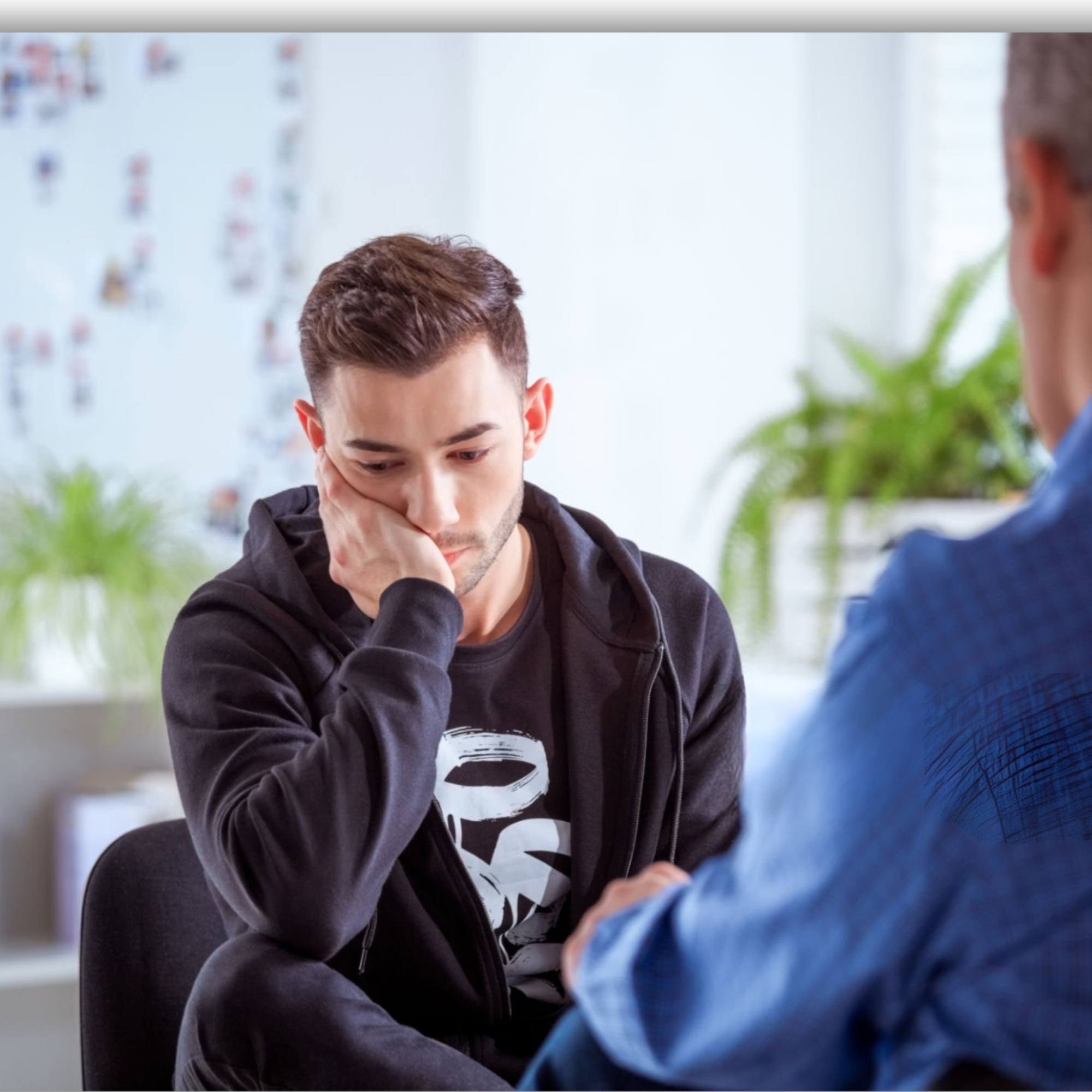 Client discussing mental health conditions with a counseling professional